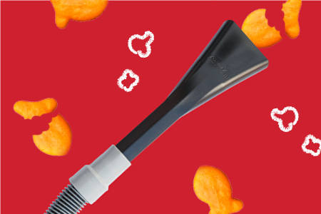 1517_TX_MKT_Services Page Updated Assets-Services-4-v2 vacuum sucking up goldfish snacks on red background
